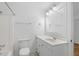 Bright white bathroom features vanity, mirror, sink, toilet and shower-tub combo at 811 Treeloft Trce, Seabrook Island, SC 29455