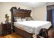 Comfortable bedroom featuring a large bed, side tables with lamps, and a decorative headboard at 8692 Bentwood Dr, North Charleston, SC 29406