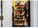 A storage closet features shelving to maximize space and organization at 8692 Bentwood Dr, North Charleston, SC 29406