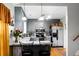 Bright eat-in kitchen boasts stainless steel appliances and breakfast bar seating at 8692 Bentwood Dr, North Charleston, SC 29406