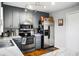 Updated eat-in kitchen with stainless steel appliances and bright lighting at 8692 Bentwood Dr, North Charleston, SC 29406
