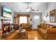 This living room features a fireplace, hardwood floors, and neutral colors at 8692 Bentwood Dr, North Charleston, SC 29406