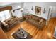 View from above of the living room featuring two couches, hardwood floors and a ceiling fan at 8692 Bentwood Dr, North Charleston, SC 29406
