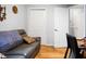 Living room featuring a sofa, a closet, and a doorway at 8692 Bentwood Dr, North Charleston, SC 29406