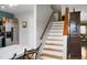 View of the staircase from the kitchen at 8692 Bentwood Dr, North Charleston, SC 29406