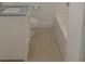 Bathroom with vanity, toilet, and tile flooring at 8930 Selah St, North Charleston, SC 29406