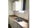 Kitchen showing stainless steel sink, faucet, and cabinets at 8930 Selah St, North Charleston, SC 29406