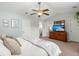 Spacious bedroom with a large dresser and a view into the en-suite bathroom at 9049 Parlor Dr, Ladson, SC 29456