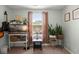Calm bedroom setup with window, indoor plants, side table, and neutral color palette at 9049 Parlor Dr, Ladson, SC 29456