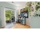 Bright home office with sliding door to patio, natural light, and charming decor at 9049 Parlor Dr, Ladson, SC 29456
