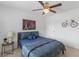 Comfortable bedroom featuring a ceiling fan, neutral walls, and complementary decor at 9713 Cutleaf Dr, Ladson, SC 29456