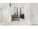 Bonus room with a bar table, chairs, popcorn maker, and mini-refrigerator, ideal for relaxation and entertainment at 9713 Cutleaf Dr, Ladson, SC 29456
