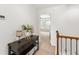 Welcoming hallway with elegant decor, including a console table with lamps and a decorative plant at 9713 Cutleaf Dr, Ladson, SC 29456