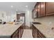 Spacious kitchen with a large island, stainless steel appliances, granite countertops, and ample storage space at 9713 Cutleaf Dr, Ladson, SC 29456