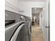 Convenient laundry area with modern washer and dryer and ample room at 9713 Cutleaf Dr, Ladson, SC 29456