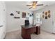 Inviting home office with a large desk, natural light, and neutral walls at 9713 Cutleaf Dr, Ladson, SC 29456