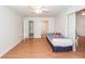Bedroom features wood-look floors, a ceiling fan, and closet space at 102 Sandy Hook Ct, Summerville, SC 29486