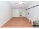 Bright living room with sliding barn door and french doors to outside at 102 Sandy Hook Ct, Summerville, SC 29486