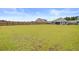 Spacious backyard with full fence, perfect for outdoor activities and enjoying the surroundings at 104 Wild Orchid Way, Huger, SC 29450