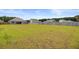 Large, well-maintained backyard with a fence, offering a secure space for recreation and relaxation at 104 Wild Orchid Way, Huger, SC 29450