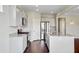 Well-lit kitchen with stainless steel appliances, ample countertop space, and convenient center island at 104 Wild Orchid Way, Huger, SC 29450
