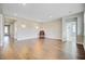 Spacious living room with hardwood floors and recessed lighting, perfect for entertaining at 104 Wild Orchid Way, Huger, SC 29450