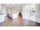 Open concept kitchen and living room with recessed lights, hardwood floors and stainless appliances at 104 Wild Orchid Way, Huger, SC 29450