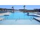 Community pool with a lake view, offering a relaxing setting for recreation and leisure at 104 Wild Orchid Way, Huger, SC 29450