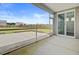 Screened porch offering an inviting view of the backyard and a seamless transition to the outdoors at 104 Wild Orchid Way, Huger, SC 29450
