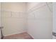 Empty walk-in closet with wire shelving and neutral carpeting for organized storage at 104 Wild Orchid Way, Huger, SC 29450