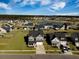 Spacious suburban home with a well manicured lawn, lake view and modern amenities at 107 Cotton Blossom Way, Summerville, SC 29485