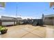 Well-maintained backyard with a concrete patio and outdoor spa, ideal for relaxation and entertainment at 107 Cotton Blossom Way, Summerville, SC 29485