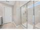 Bathroom showcasing a glass-enclosed shower with tile surround and modern fixtures at 107 Cotton Blossom Way, Summerville, SC 29485