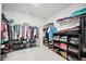 Walk-in closet with ample shelving and hanging space for organized storage solutions at 107 Cotton Blossom Way, Summerville, SC 29485
