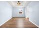 Bright dining room with modern lighting, hardwood floors and neutral paint at 107 Cotton Blossom Way, Summerville, SC 29485