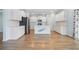 Modern kitchen featuring white cabinets, stainless steel appliances, and a center island with counter seating at 107 Cotton Blossom Way, Summerville, SC 29485