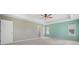 Large main bedroom featuring neutral carpet, tray ceiling, natural light, and ample space for relaxation and personalization at 107 Cotton Blossom Way, Summerville, SC 29485