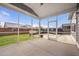 Relaxing screened-in patio providing views of the backyard, perfect for outdoor entertainment and enjoyment at 107 Cotton Blossom Way, Summerville, SC 29485