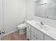 This half bath features a single sink with white cabinetry and vinyl flooring at 109 Evance Ct, Summerville, SC 29485