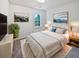 This spacious bedroom features neutral walls, natural light and stylish decor at 109 Evance Ct, Summerville, SC 29485