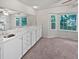 Bright dining room featuring a dry bar, ample storage, and a bay window at 109 Evance Ct, Summerville, SC 29485