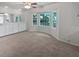 Bright dining room with a built-in dry bar and a large bay window at 109 Evance Ct, Summerville, SC 29485
