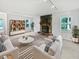 Bright living room showcasing stylish furniture, a stone fireplace, and ample natural light at 109 Evance Ct, Summerville, SC 29485