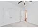 Bedroom featuring an open doorway, carpet flooring, and double door closet for storage at 112 Mayfield Dr, Goose Creek, SC 29445