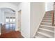 Inviting entryway showcases hardwood floors, staircase with carpet, and an open living area at 112 Mayfield Dr, Goose Creek, SC 29445