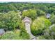 Aerial view of estate home with mature landscaping and driveway at 115 Old Postern Rd, Summerville, SC 29483