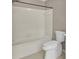 Clean bathroom with white tiles, a shower-tub combo, and updated fixtures at 115 Old Postern Rd, Summerville, SC 29483