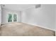 Bedroom features a neutral carpet and french doors at 115 Old Postern Rd, Summerville, SC 29483