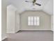 This bedroom boasts neutral walls, neutral carpet, and shuttered windows at 115 Old Postern Rd, Summerville, SC 29483