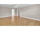 Large bedroom featuring hardwood floors and an open doorway to a hallway at 115 Old Postern Rd, Summerville, SC 29483